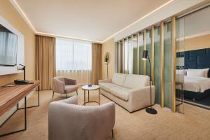 Ένα ή περισσότερα κρεβάτια σε δωμάτιο στο Radisson Blu Szczecin