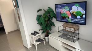 TV a/nebo společenská místnost v ubytování Casa Vive