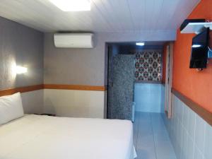 Cama ou camas em um quarto em Inter Hotel