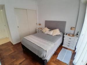 Кровать или кровати в номере Estadia F&F