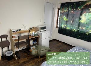 Kuchyň nebo kuchyňský kout v ubytování 11月フルリフォーム 12月オープン恐竜一色ゲストハウスDinosaur Guesthouse