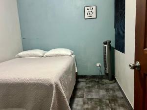 Postel nebo postele na pokoji v ubytování Casa Laureles