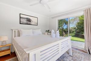 Letto o letti in una camera di The Breezy Maple - Hinterland and range views in Mapleton