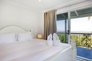 Letto o letti in una camera di The Breezy Maple - Hinterland and range views in Mapleton