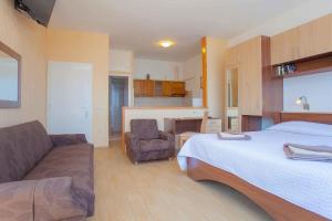 Postel nebo postele na pokoji v ubytování Guest House Lovrić