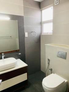 Ванная комната в Alfred towers - New Luxury apartment