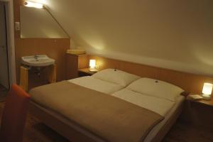 Posteľ alebo postele v izbe v ubytovaní Appartements Kronig