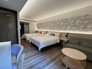 Postel nebo postele na pokoji v ubytování Delight Hotel + 37 fotografií