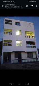 a picture of a building with the words lit up at MAGNOLIA SUITES in Ukunda