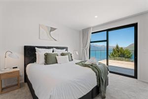 Giường trong phòng chung tại Modern, Plush & Picturesque - Wynyard Top