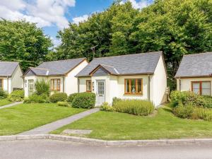 a row of houses in a residential neighborhood at 1 Bed in Tintagel 89239 in Davidstow