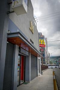 a mcdonalds building on a city street with a sign at JM Express in Monterrey
