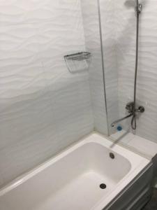 Kylpyhuone majoituspaikassa GRAND SARBON HOTEL