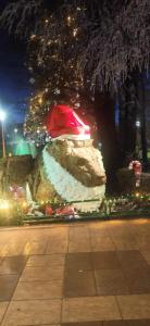 a christmas statue with a hat on top of it at La casa de Wael in Ifrane