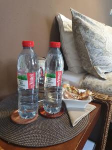 Nápoje v ubytování Chambre double accueillante avec douche privative