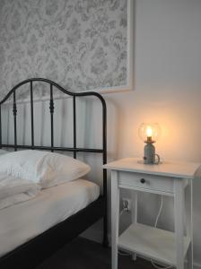 Łóżko lub łóżka w pokoju w obiekcie Chabrowy - Apartamenty Smart Projekt