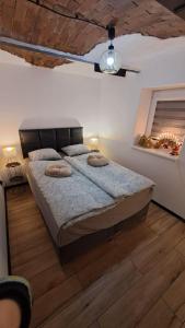 Cama ou camas em um quarto em Wiejsko-Sielsko