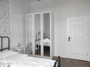 Łóżko lub łóżka w pokoju w obiekcie Chabrowy - Apartamenty Smart Projekt