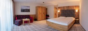 Postel nebo postele na pokoji v ubytování Hotel Sendlhof