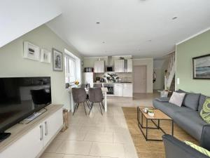 Η κουζίνα ή μικρή κουζίνα στο Ferienwohnung Hafenblick - Wunderbare Erholung am Hafen