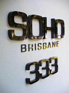 a sign for the sbb brisbane at Soho Brisbane in Brisbane