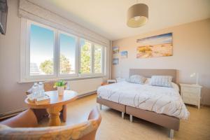 Postel nebo postele na pokoji v ubytování B&B De Kleine Prins + 37 fotografií