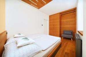 Katil atau katil-katil dalam bilik di Apartment Hradečanka
