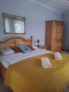 Posteľ alebo postele v izbe v ubytovaní Willa Wisienka