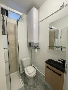 Ванная комната в Charmant appartement proche Paris et Stade de France !