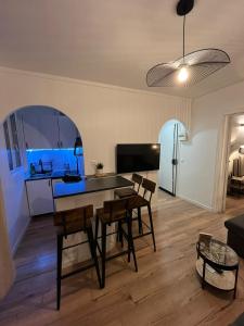 Телевизор и/или развлекательный центр в Charmant appartement proche Paris et Stade de France !