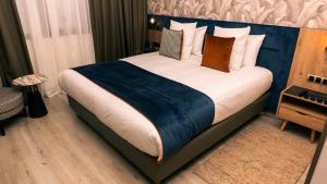 Letto o letti in una camera di Hotel Ben Batouta - Tanger