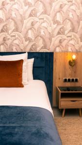Letto o letti in una camera di Hotel Ben Batouta - Tanger