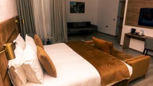 Letto o letti in una camera di Hotel Ben Batouta - Tanger