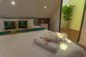 Voodi või voodid majutusasutuse THE ELITE HOTEL toas