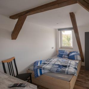 Postel nebo postele na pokoji v ubytování Ferienwohnung Pfaffentalblick