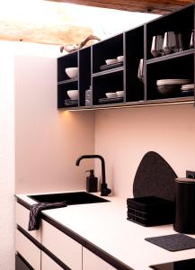 Küche/Küchenzeile in der Unterkunft YokoLou - Design-Apartments