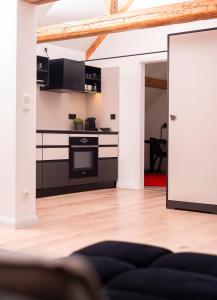 Küche/Küchenzeile in der Unterkunft YokoLou - Design-Apartments