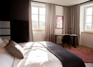 Ein Bett oder Betten in einem Zimmer der Unterkunft YokoLou - Design-Apartments