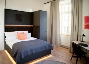 Ein Bett oder Betten in einem Zimmer der Unterkunft YokoLou - Design-Apartments