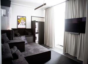 TV/Unterhaltungsangebot in der Unterkunft YokoLou - Design-Apartments