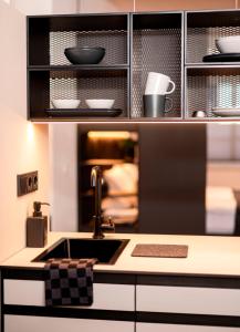 Küche/Küchenzeile in der Unterkunft YokoLou - Design-Apartments