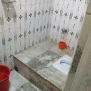 a bathroom with a sink and a toilet at Meera Guest House,Cuttack in Cuttack