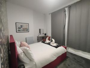 Billede fra billedgalleriet på Modern 3-Bed Apartment with Kitchen in Town i Bury