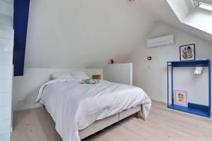 Postel nebo postele na pokoji v ubytování Appartement (8 pers.) design.