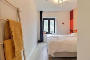 Postel nebo postele na pokoji v ubytování Appartement (8 pers.) design.