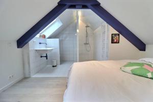 Postel nebo postele na pokoji v ubytování Appartement (8 pers.) design.