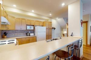 Η κουζίνα ή μικρή κουζίνα στο Tree Tops 10