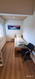 Postel nebo postele na pokoji v ubytování Mountain - Lake Apartement 1