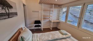 Postel nebo postele na pokoji v ubytování Mountain - Lake Apartement 1