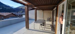 En balkon eller terrasse på Mountain - Lake Apartement 1
